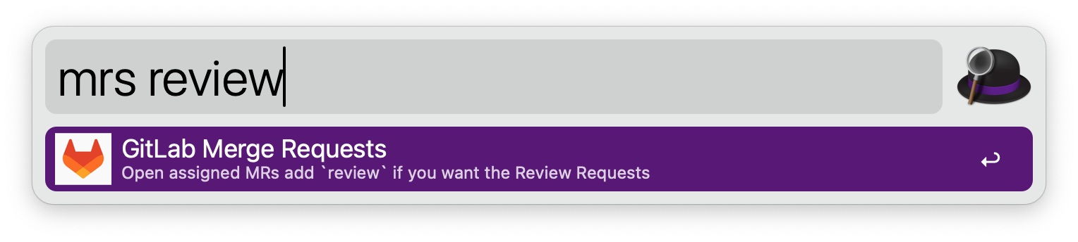 The window of Alfred app is visible and the command ‘mrs review’ was entered. Below the command you can see a short description of what the command will do.